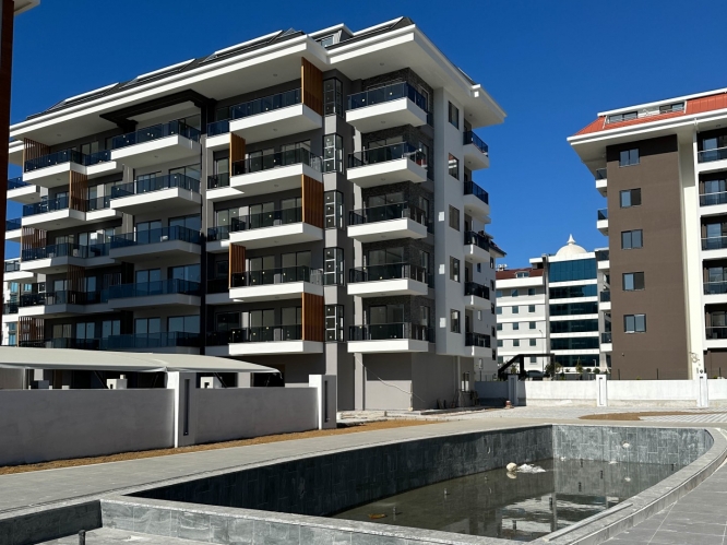 New building in Kestel with sea view